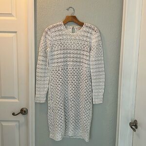 Michael Kors long sleeve white crochet dress with nude slip.